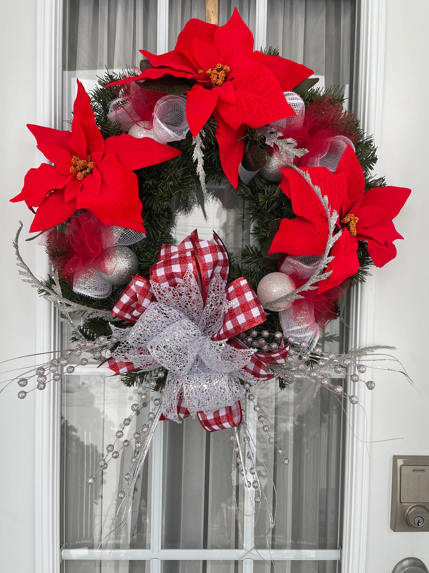 Couronne " NOËL en fleurs"