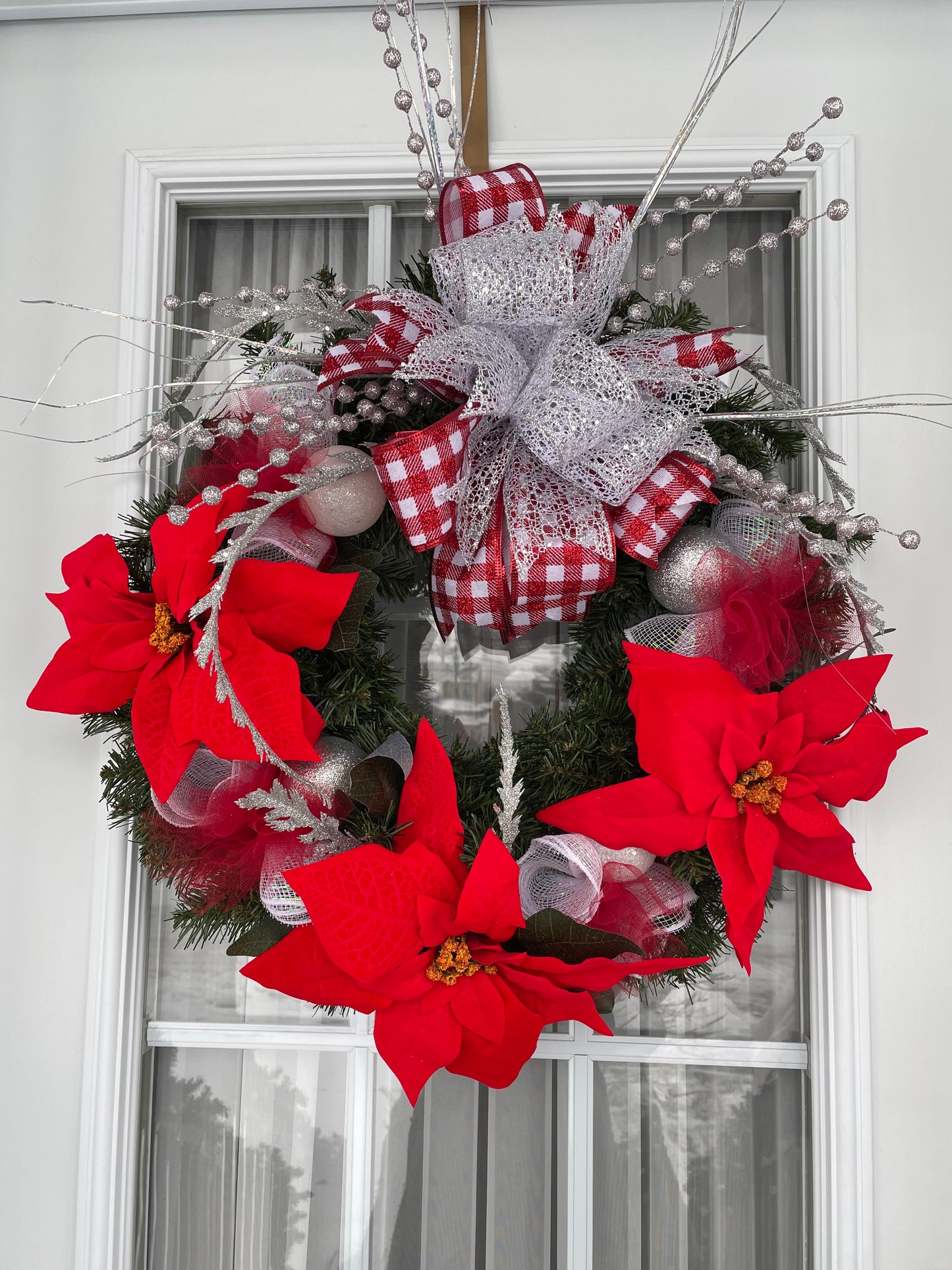 Couronne " NOËL en fleurs"