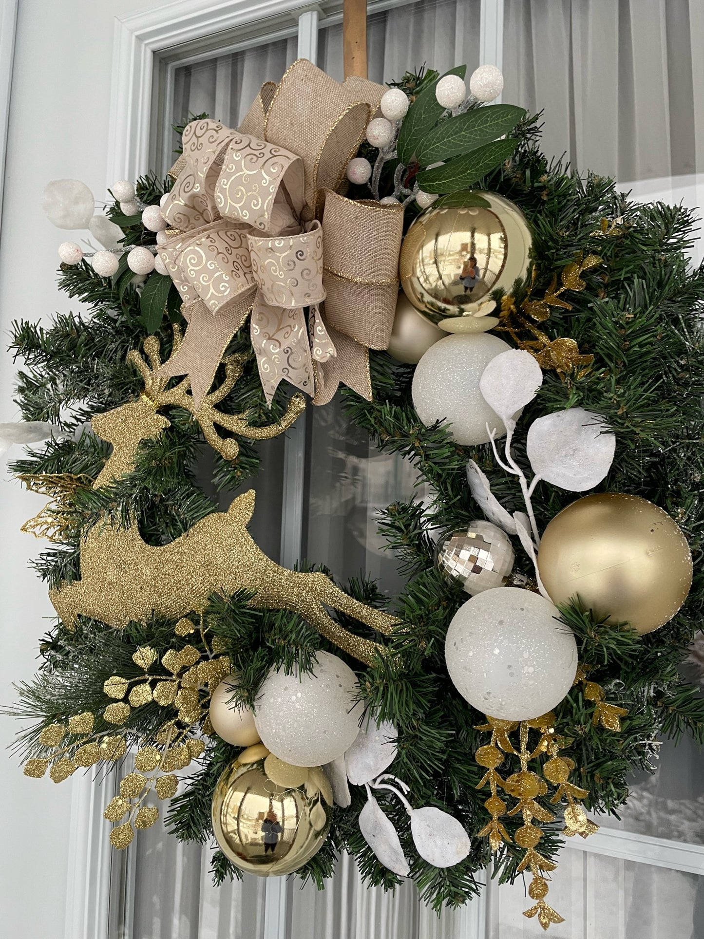 Christmas wreath "The Reindeer with the Golden Nose"